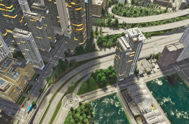 An overhead view of an urban city with several green areas in this still from the video game Cities: Skylines II.