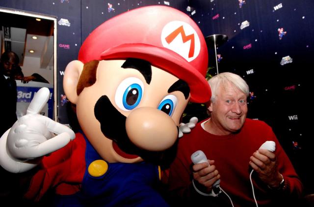 The voice of Super Mario, Charles Martinet, poses with mario at GAME Oxford Street, central London, on the evening that Super Mario Galaxy on the Nintendo Wii goes on sale in the UK.   (Photo by Stephen Kelly - PA Images/PA Images via Getty Images)