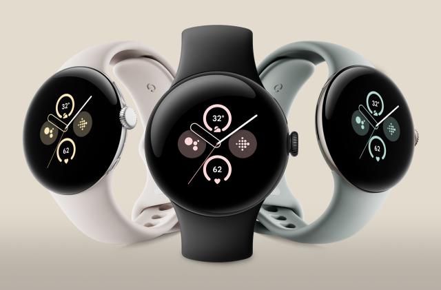 Hero image of the Google Pixel Watch 2 with three units in a row on a cream background.