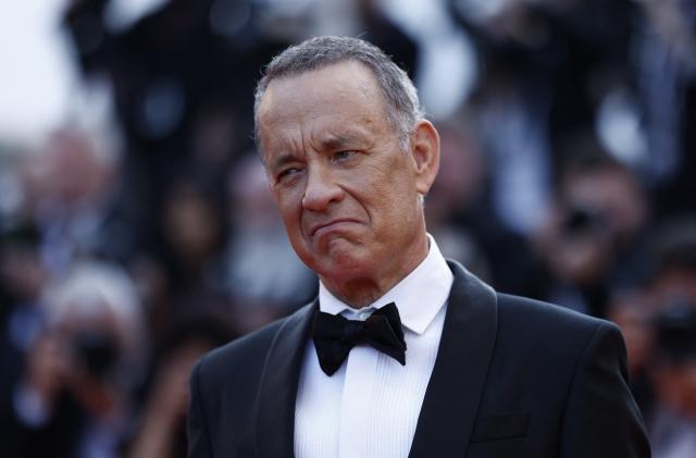 The 76th Cannes Film Festival -  Screening of the film "Asteroid City" in competition - Red Carpet Arrivals - Cannes, France, May 23,  2023. Cast member Tom Hanks poses. REUTERS/Gonzalo Fuentes
