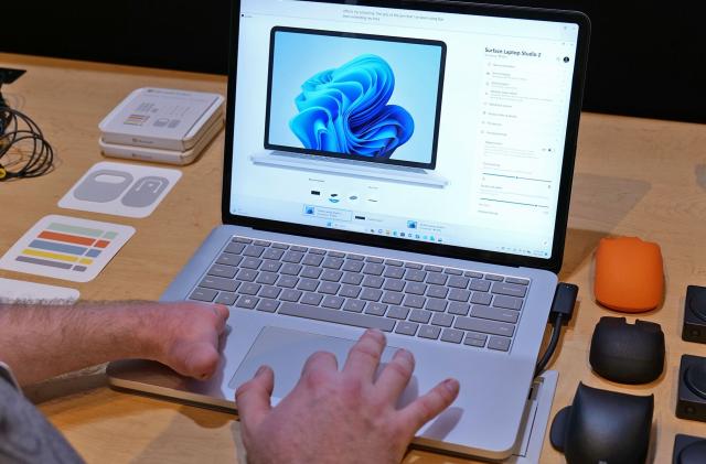 The Surface Laptop Studio 2 trackpad with a person using the trackpad.