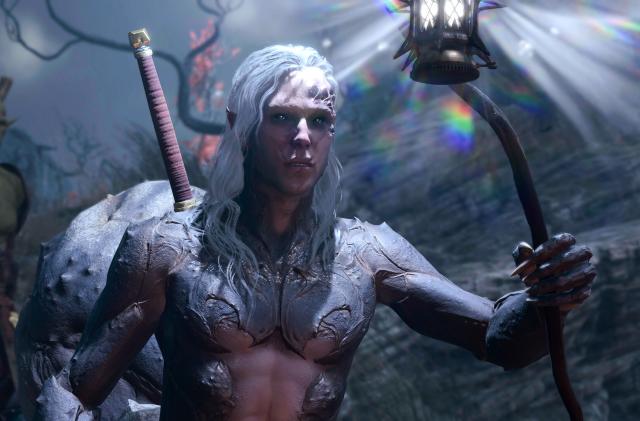 A humanoid with white hair and a sword strapped to their back holds a staff that emits a bright light. Behind them is a stoic goblin- or orc-like being.