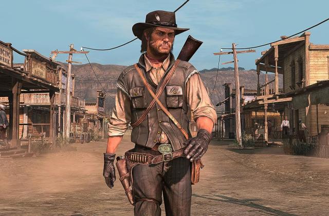 Screenshot from the original Red Dead Redemption (2010) ported onto the PS4. John Marston (protagonist) walks down a dusty road in the middle of an Old West town.