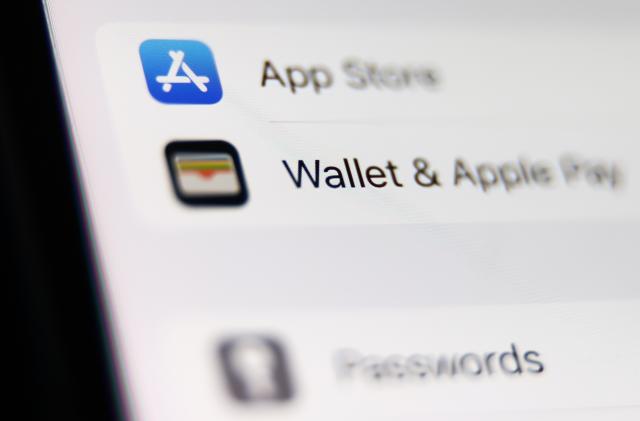 App Store and Wallet icons are seen on a phone screen is seen in this illustration photo taken in Krakow, Poland on August 6, 2023. (Photo by Jakub Porzycki/NurPhoto via Getty Images)