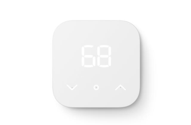 A white thermostat against plain white background. 