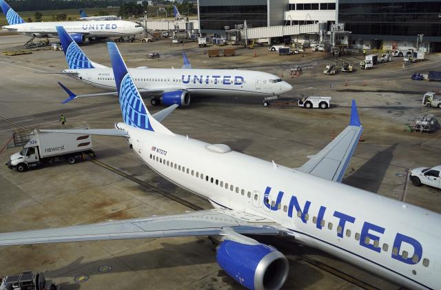 A United Airlines plane is pushed from the gate at George Bush Intercontinental Airport Friday, Aug. 11, 2023, in Houston. (AP Photo/David J. Phillip)